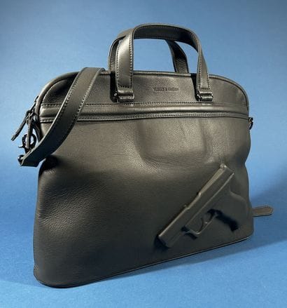 VLIEGER & VANDAM 
Serviette en cuir gris...