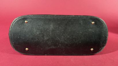 CÉLINE
Sac en cuir grainé noir, fermeture...