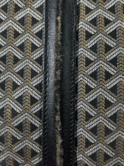 GOYARD
Valise de voyage souple chiffrée 