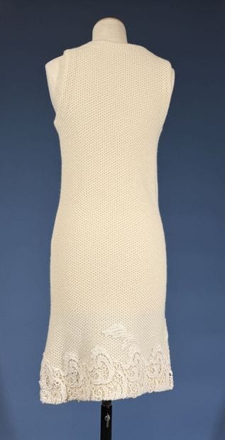 ERMANNO SCERVINO
Ensemble en laine ivoire...