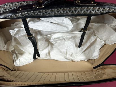 GOYARD
Valise de voyage souple chiffrée 