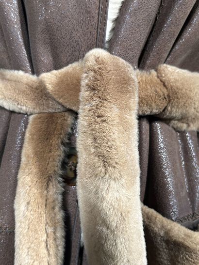FISCHELIS
Manteau réversible en peau retournée...