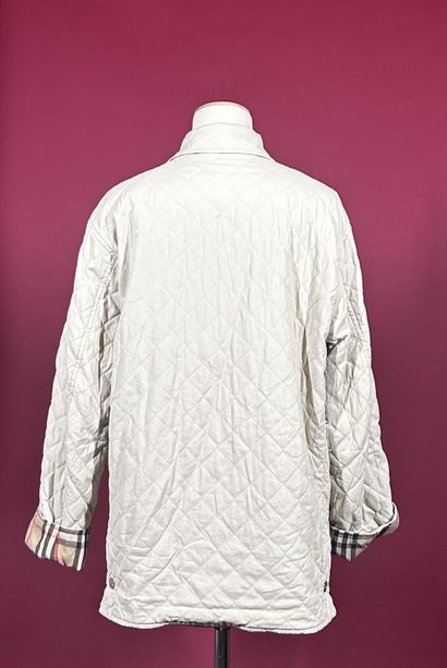 BURBERRYS'
Veste coupe-vent matelassée ivoire...