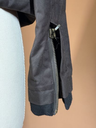 GIVENCHY 
Blouson en toile enduite marron...
