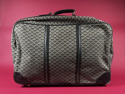 GOYARD
Valise de voyage souple chiffrée 