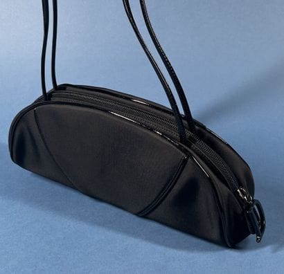 CHRISTIAN DIOR 
Sac du soir demi-lune en...