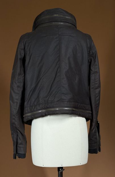 GIVENCHY 
Blouson en toile enduite marron...