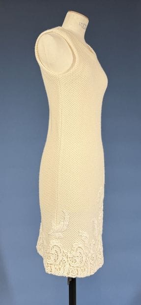 ERMANNO SCERVINO
Ensemble en laine ivoire...