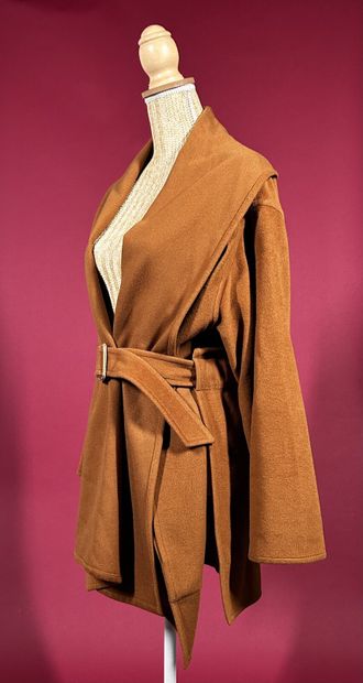 HERMÈS Paris
Veste en cachemire camel façon...