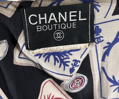 CHANEL boutique
Tailleur en tweed marine...