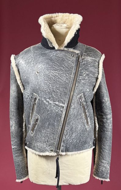 ACNE 
Blouson en peau lainé noir effet vieilli,...