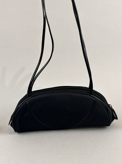 CHRISTIAN DIOR 
Sac du soir demi-lune en...