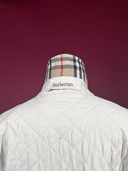 BURBERRYS'
Veste coupe-vent matelassée ivoire...