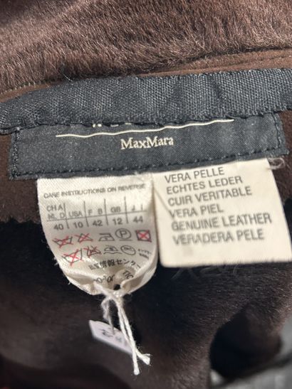 WEEK END MAX MARA
Veste en peau lainée marron,...