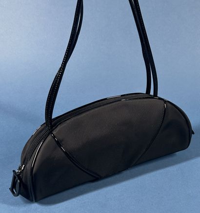 CHRISTIAN DIOR 
Sac du soir demi-lune en...