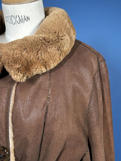 FISCHELIS
Manteau réversible en peau retournée...