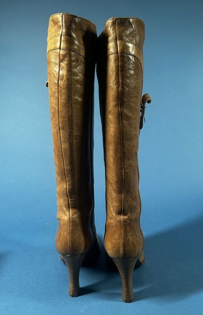 DOLCE & GABBANA
Paire de bottes en cuir beige...