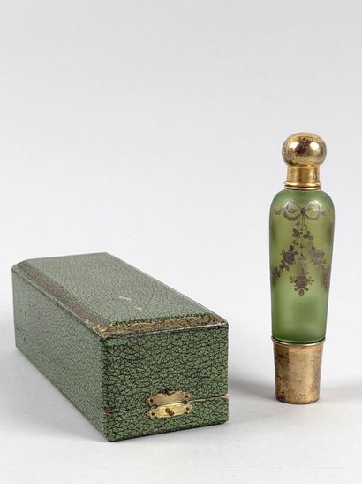 Enameled glass bottle decorated with flowers,...