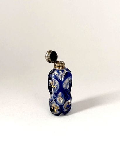 Blue-tinted glass salt bottle with gold enamel,...