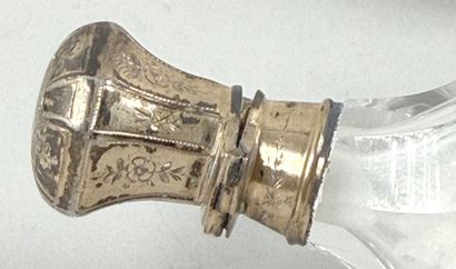 Set including: 
- A silver rattle (800 parts...