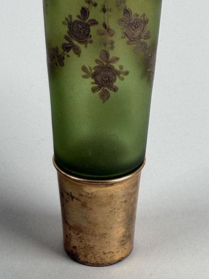 Enameled glass bottle decorated with flowers,...