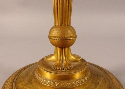 Paire de flambeaux en bronze ciselé et doré,...