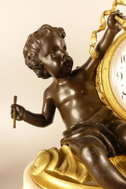 Pendule et paire de candélabres en bronze...