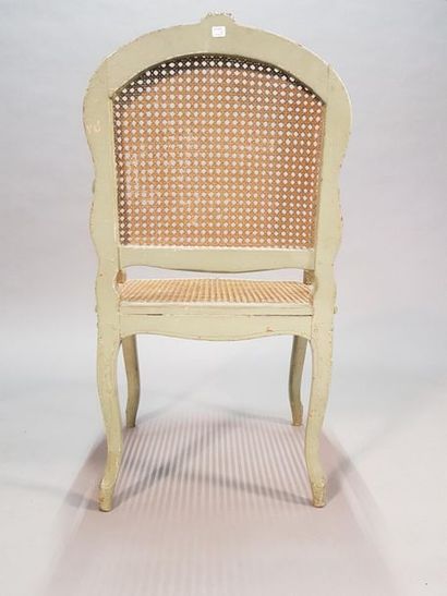 Paire de fauteuils cannés en bois mouluré,...