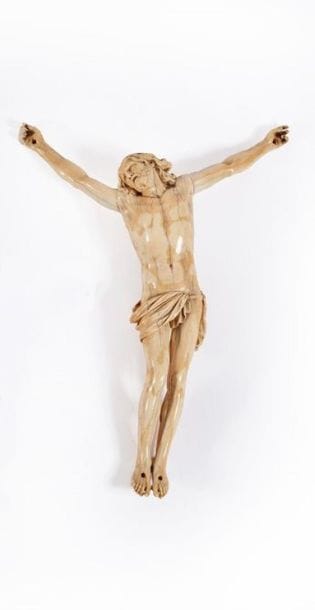 Christ en ivoire sculpté, la bouche ouverte.
Vers...