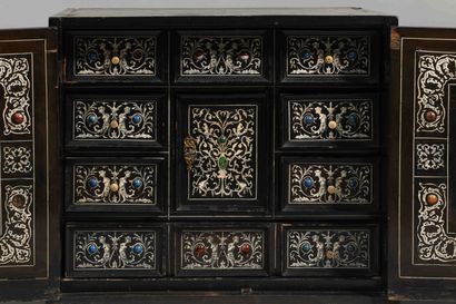 
Black stained wood cabinet with two doors...