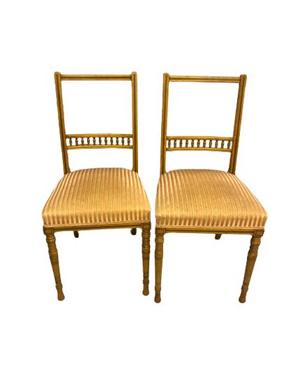 
Pair of blond wood chairs with openwork...