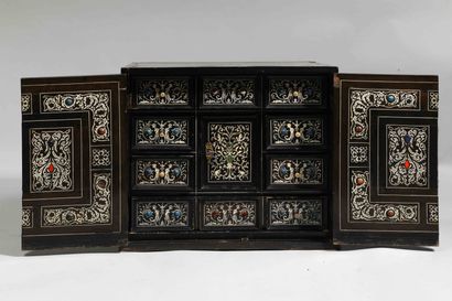 
Black stained wood cabinet with two doors...