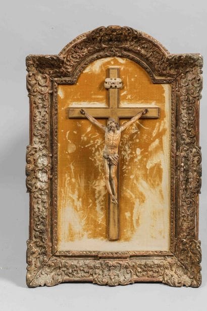 
Ivory crucifix on a gilded wooden cross...