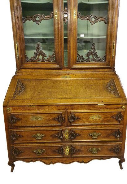 
TWO BODY CABINET in natural wood, moulded...
