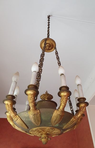 
An ormolu and patinated nine-armed basin...