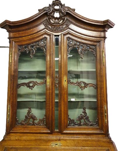 
TWO BODY CABINET in natural wood, moulded...