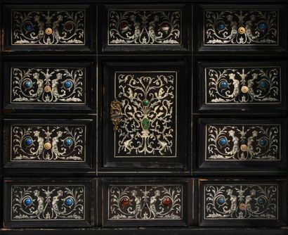 
Black stained wood cabinet with two doors...