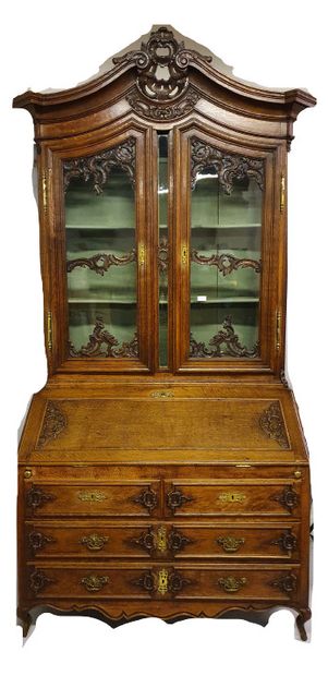 
TWO BODY CABINET in natural wood, moulded...