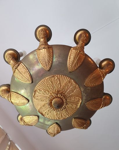 
An ormolu and patinated nine-armed basin...