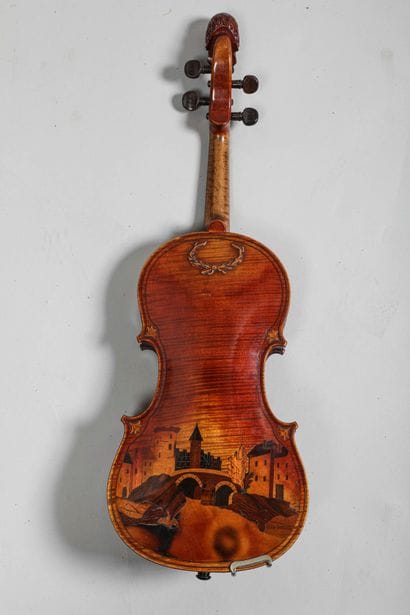 
Violin with case and bow
Neck carved with...