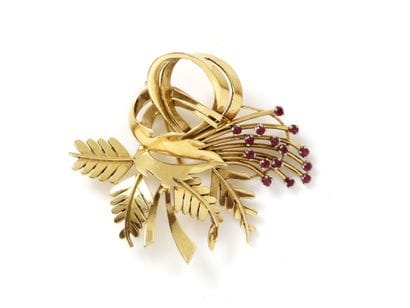 Broche en or 750 millièmes, à décor de gerbe...