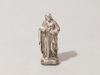 Statuette : le Christ du Sacré-Cœur en argent....