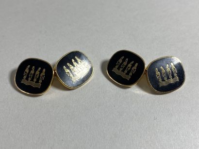 PAIR OF HANDLEBUTTONS in gilt metal and black...