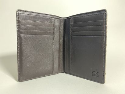 Calvin KLEIN
Wallet in monogrammed canvas...