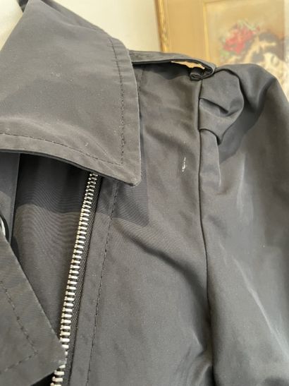 MONCLER
Black raincoat with chrome metal...