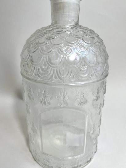 GUERLAIN
Molded glass bottle, colorless bee...