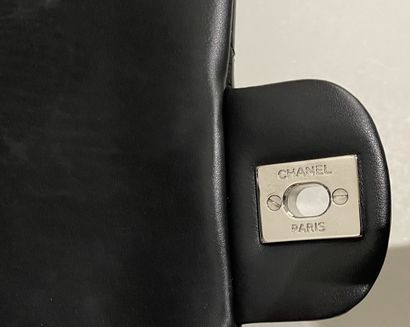 CHANEL 
POCKET in dark grey quilted patent...