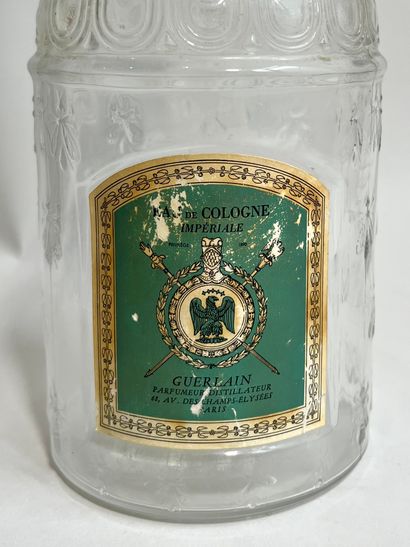 GUERLAIN
Moulded glass bottle with bee model...