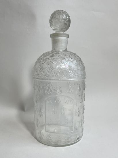 GUERLAIN
Molded glass bottle, colorless bee...