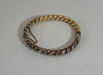 18K (750 thousandths) yellow gold TWISTED...